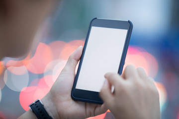 People use smartphone on evening street