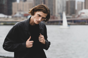 Handsome man, wearing black clothes in New York