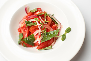 vegetable salad on a white plate