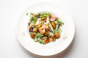 seafood with vegetables in a plate