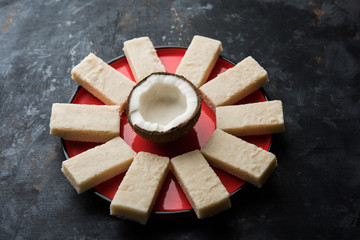 Coconut Burfi / Kopra  Pak/ Fresh Nariyal Fudge, selective focus