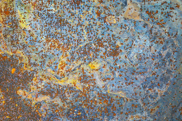 Abstract grunge rustic background. Colorful rusty background. Selective focus