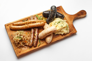 sausages on a wood with a cabbage