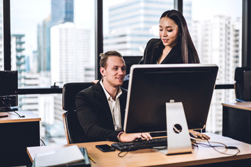 Successful of two casual business discussing and working with laptop computer.creative business people planning and brainstorm in modern office.Teamwork concept