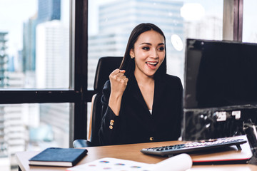 Businesswoman working with laptop computer.creative business people planning at modern work loft