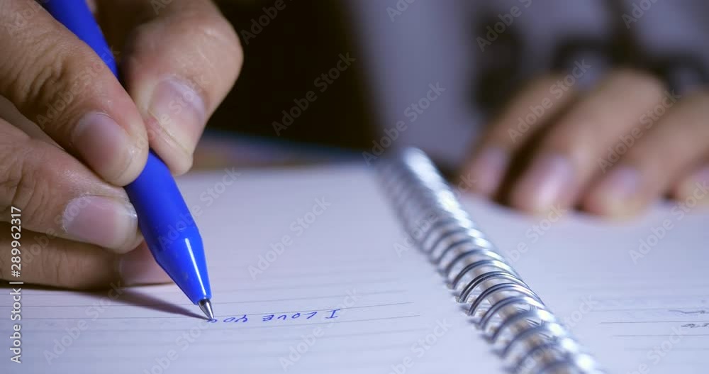 Poster close-up for hand pen writing in a notebook