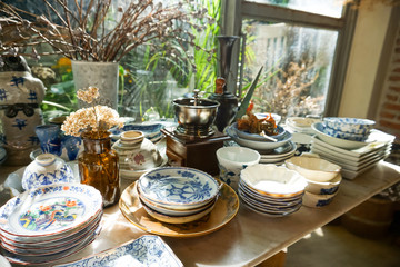 old vintage thai ceramic table ware on table