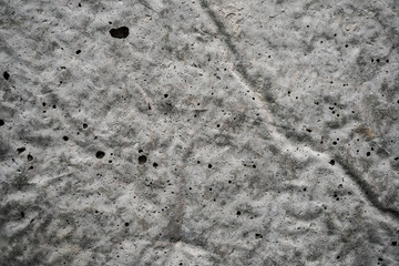 Texture of uneven old concrete slab. Background image macro photo of concrete