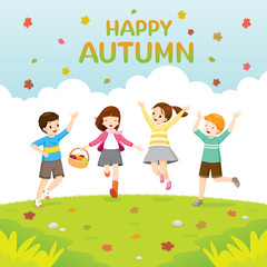 Obraz na płótnie Canvas Happy Children Jumping Together In Autumn Season