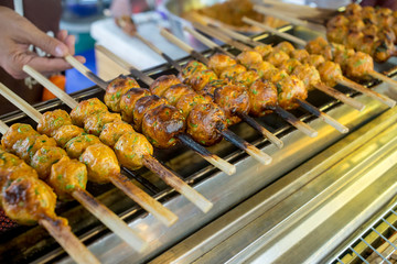 Raw grilled spicy fish cake or dried Janglon, focus selective