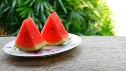 Closeup watermelon on wooden table with nature background