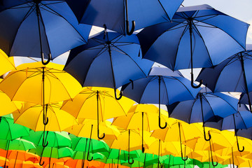 Fototapeta na wymiar Colorful umbrellas decoration welcoming the summer