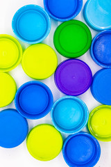 A colorful plastic bottle cap on a white background