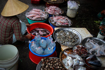 Medium shot of fresh fishes and seafoods at the Dong Ba Market in Hue Vietnam