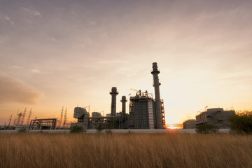 Fototapeta na wymiar power plant at sunset..