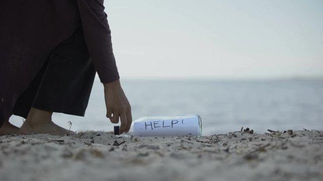 Woman finds message Help in bottle, chance to save survivors, find missed people