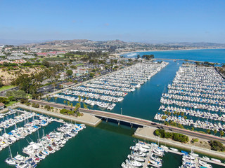 Aerial view of Dana Point Harbor and her marina with yacht and sailboat. southern Orange County, California. USA - obrazy, fototapety, plakaty