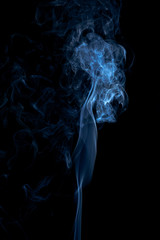 Blue smoke on dark background