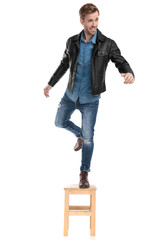 man maintaining his balance fooling around
