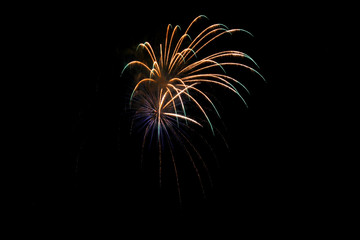 Colorful fireworks in night sky background