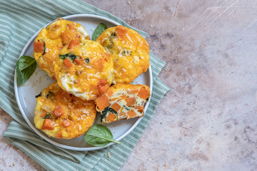 Delicious egg muffins with sweet potato, spinach and onion