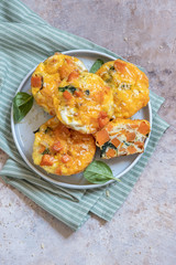 Delicious egg muffins with sweet potato, spinach and onion