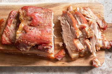 Roasted carameled pork belly on a board