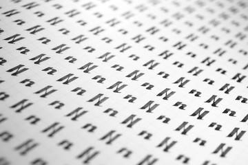 Calligraphy black and white letters N background. Lettering practice writing worksheet. Handwriting...