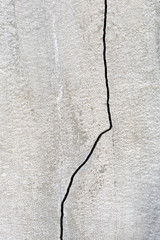 Cement wall cracked texture background.