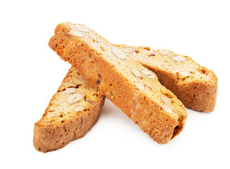 heap of cantuccini cookies on white background