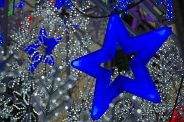 light of blue star and white light decorate for Christmas and new year season.