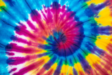 Tie dye rainbow color spiral abstract pattern background . hippie and reggae style .
