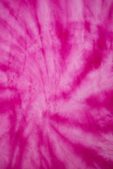 Fototapeta na wymiar pink spiral tie dye pattern vertical background