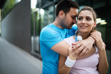 Fototapeta premium Sporty happy couple exercising together. Sport concept
