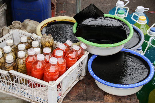 Grass jelly or Suong Sao made from Chinese mesona plant, sold in the local market in Hue Vietnam 