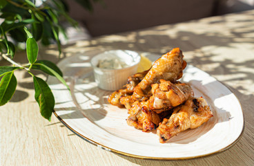 grilled chciken with sauce and lemon