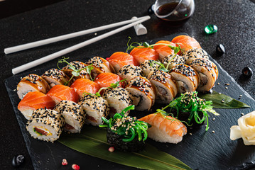 sushi on the black background