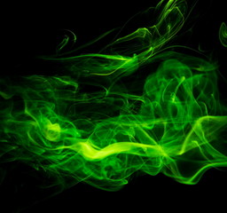Green smoke on black background