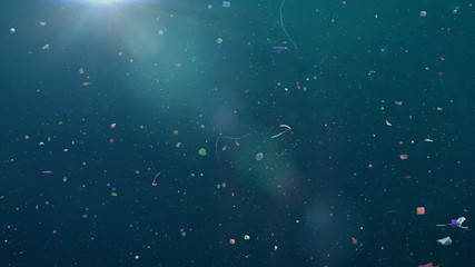 microplastics floating in the current, micro plastic pollution in ocean water © dottedyeti