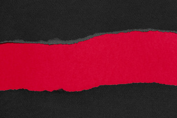 Black Friday black and red background, ragged sheets of textured paper