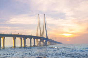 Bandra Worli sea link bridge of Mumbai and golden dramatic sky and cloud