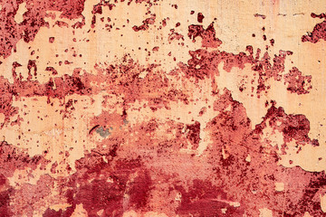 Texture of a concrete wall with cracks and scratches which can be used as a background