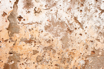 Texture of a concrete wall with cracks and scratches which can be used as a background