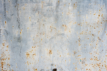 Metal texture with scratches and cracks which can be used as a background