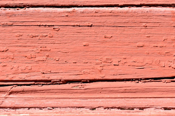 Old wooden painted wall brown color close up. Abstract background
