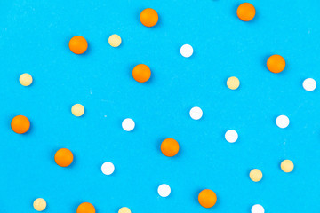 Tablets medicaments on a blue background