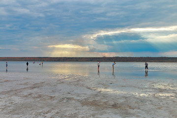 walk along the salty estuary at sunset.