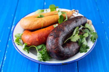 typical portuguese smoked sausages on dish