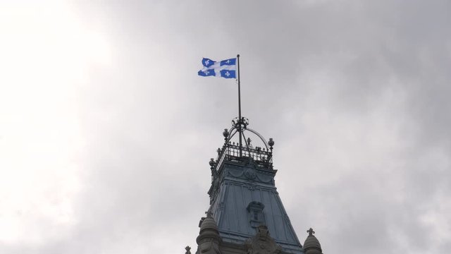 Quebec Flag Flying On Quebec Provincial Parliament Building