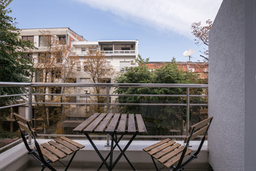 Small building apartment balcony with a view